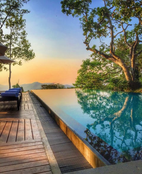 Indoor pool, outdoor pool, pool umbrellas, sun loungers
