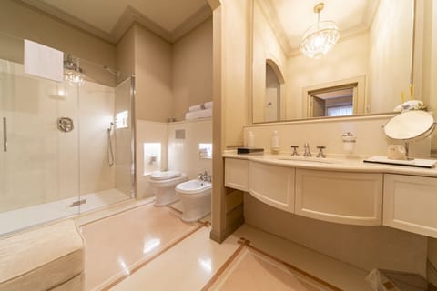 Deluxe Double or Twin Room | Bathroom | Shower, hair dryer, slippers, towels