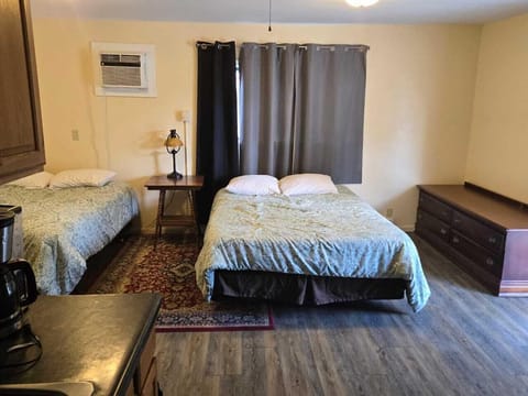 Room, 2 Double Beds | Blackout drapes, free WiFi, bed sheets