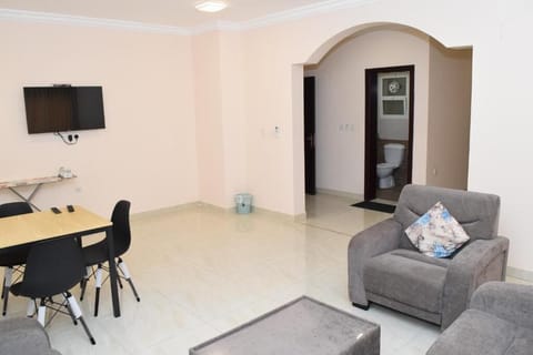 Comfort Apartment, 2 Bedrooms, Housekeeping, City View | Living area | 32-inch TV with satellite channels