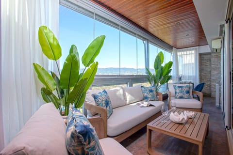 Apartment (4 Bedrooms) | Living area | 52-inch Smart TV with digital channels