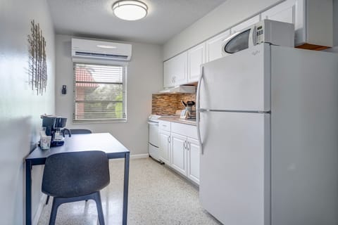 Studio Suite, 1 King Bed, Kitchen | Private kitchen | Full-size fridge, microwave, coffee/tea maker, cleaning supplies