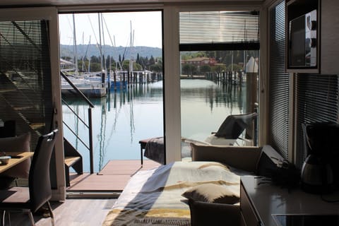 Apartment (Two Bedroom Floating House) | Living room | 32-inch flat-screen TV with satellite channels, stereo