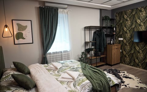 Laptop workspace, blackout drapes, soundproofing, iron/ironing board