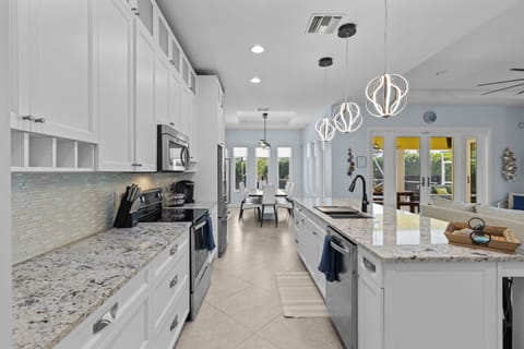House, Multiple Beds, Pool Access, Pool View (Sunrise Island Retreat) | Private kitchen | Fridge, microwave, oven, stovetop