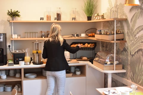 Daily buffet breakfast (EUR 12 per person)