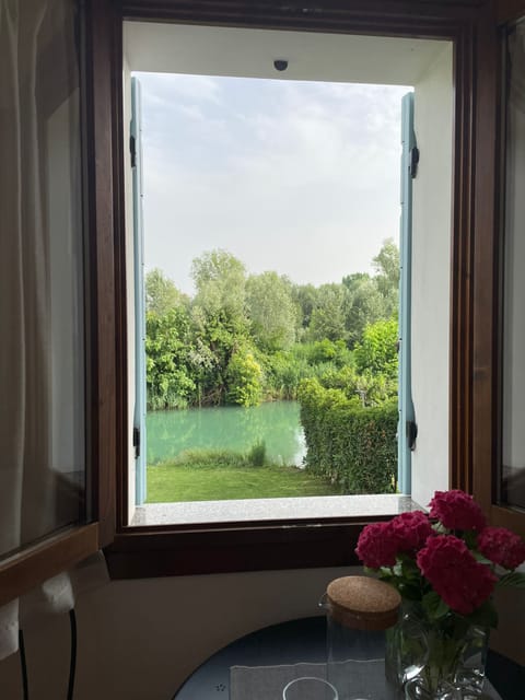 Basic Double Room Single Use, River View | Desk, laptop workspace, free WiFi