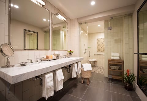 Shower, designer toiletries, hair dryer, bathrobes