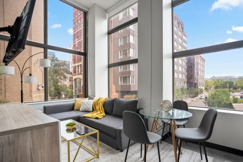 Deluxe Apartment, Non Smoking | Living area | 40-inch Smart TV with digital channels