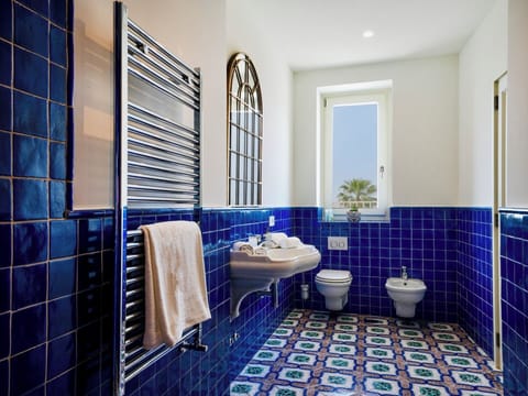 Deluxe Double or Twin Room, Sea View | Bathroom | Hair dryer, towels, soap, shampoo