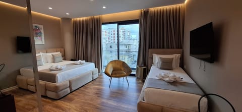 Comfort Triple Room, Balcony, City View | Desk, blackout drapes, free WiFi, bed sheets