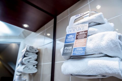 Shower, eco-friendly toiletries, hair dryer, towels