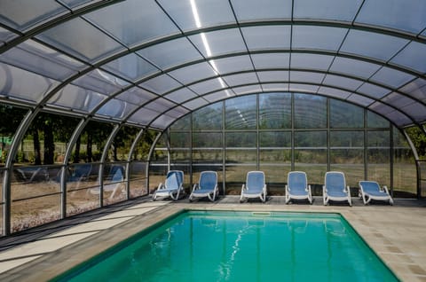 Seasonal outdoor pool, open 10:00 AM to 9:30 PM, sun loungers