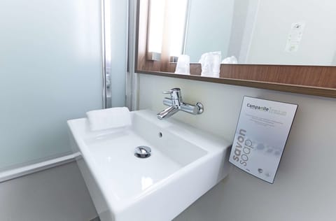 Shower, eco-friendly toiletries, hair dryer, towels