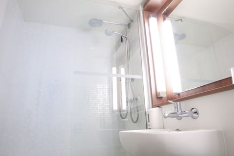 Premium bedding, desk, blackout drapes, iron/ironing board