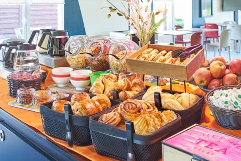 Daily buffet breakfast (EUR 12.90 per person)