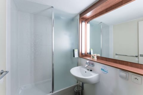 Eco-friendly toiletries, hair dryer, towels