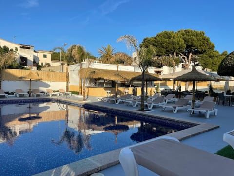 Outdoor pool, open 9:00 AM to 7:00 PM, sun loungers