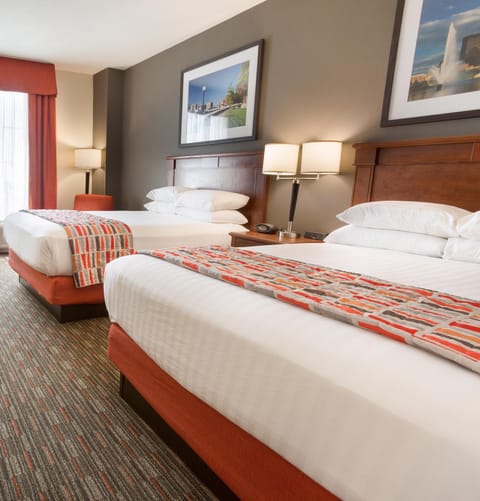 Desk, blackout drapes, iron/ironing board, free cribs/infant beds