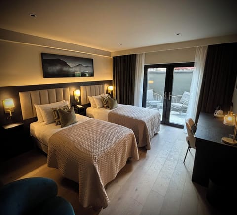 Hypo-allergenic bedding, desk, laptop workspace, iron/ironing board