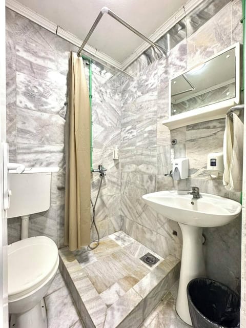 Shower, towels, soap, shampoo