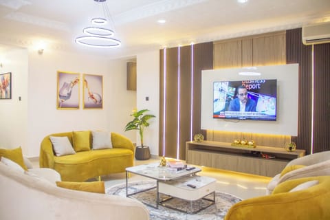 Family Apartment, Balcony, City View | Living area | Flat-screen TV