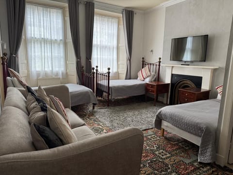 Economy Triple Room, Courtyard View | Free WiFi