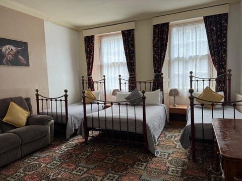 Economy Triple Room, Courtyard View | Free WiFi