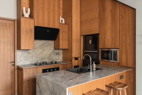 Deluxe Villa, Balcony, Pool View | Private kitchen | Coffee/tea maker, electric kettle, toaster, blender