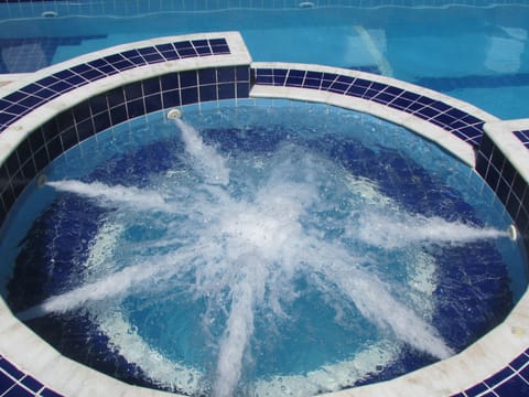 Indoor pool, outdoor pool, pool umbrellas, sun loungers
