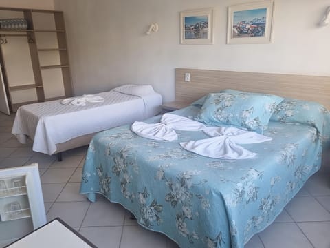 Superior Triple Room | Minibar, blackout drapes, free WiFi, bed sheets