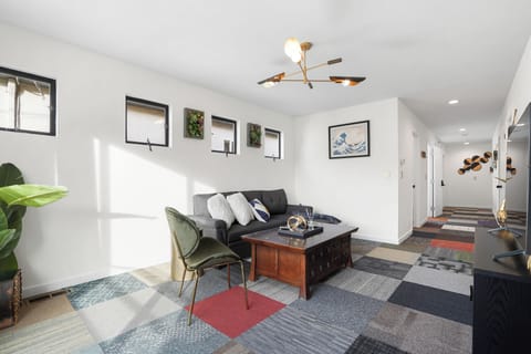 Family Apartment, 3 Bedrooms, Kitchen | Living area | 55-inch LED TV with digital channels