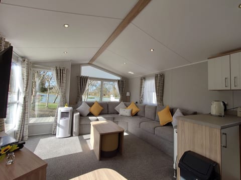 Comfort Mobile Home, 2 Bedrooms, Non Smoking, Lake View | Living area | 40-inch LCD TV with digital channels, Netflix, DVD player