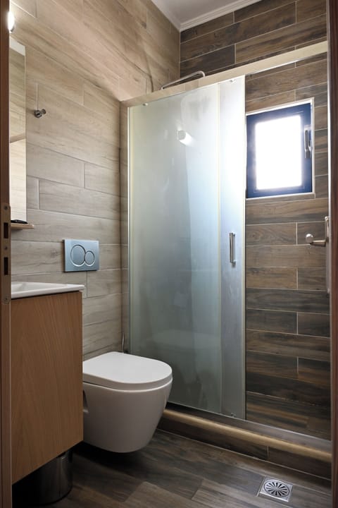 Shower, rainfall showerhead, hair dryer, towels