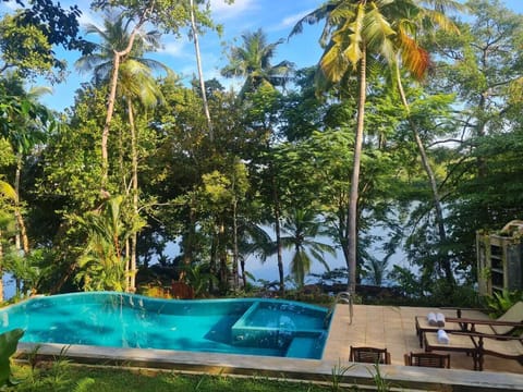 Outdoor pool, open 8:00 AM to 6:00 PM, sun loungers