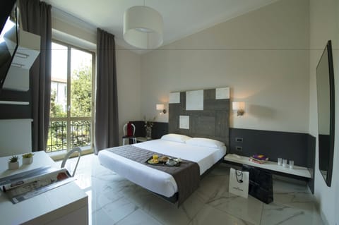 Standard Double Room | Down comforters, in-room safe, desk, free WiFi