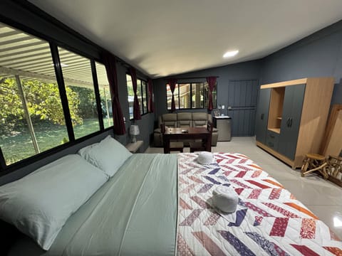 Deluxe Room, Patio, Garden View | Desk, laptop workspace, WiFi (free)