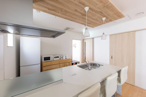 Full-size fridge, microwave, stovetop, electric kettle