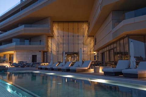 Indoor pool, outdoor pool, pool umbrellas, sun loungers