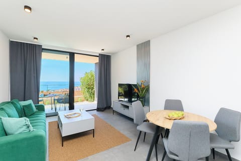Apartment (1 Bedroom) | Living room | 123-cm Smart TV with cable channels