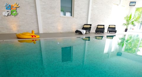 Indoor pool, open 9:00 AM to 10:00 PM, sun loungers