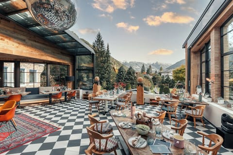 Lunch, dinner served; Regional cuisine, pool views 