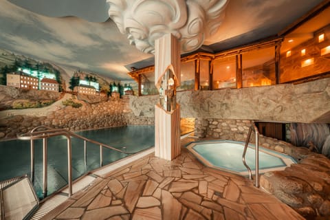 Indoor pool, outdoor pool, pool umbrellas, sun loungers