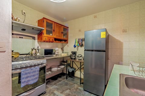 Exclusive Apartment, 4 Bedrooms, Patio, Corner | Private kitchen | Full-size fridge, microwave, oven, stovetop