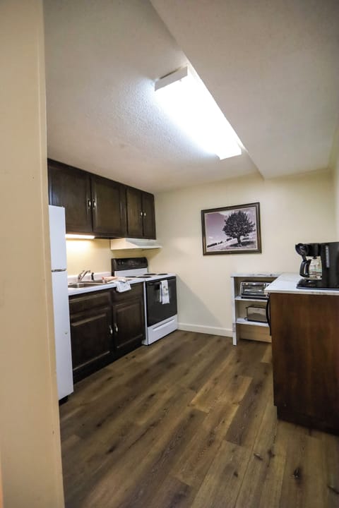 Suite, 2 Double Beds | Private kitchen | Mini-fridge, microwave