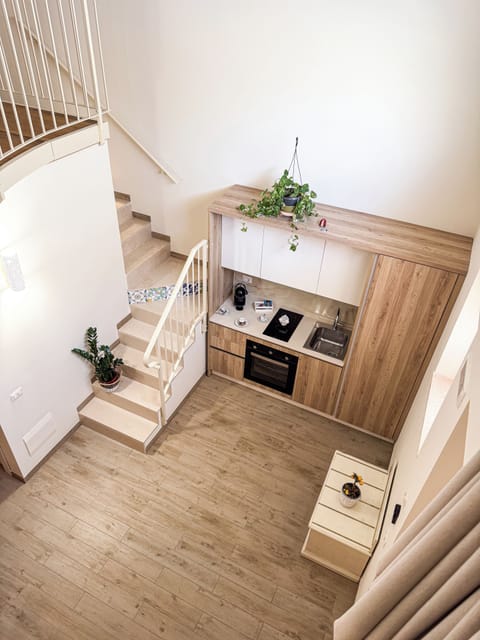 Full-size fridge, oven, stovetop, espresso maker