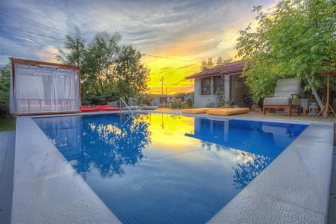 Outdoor pool, pool umbrellas, sun loungers