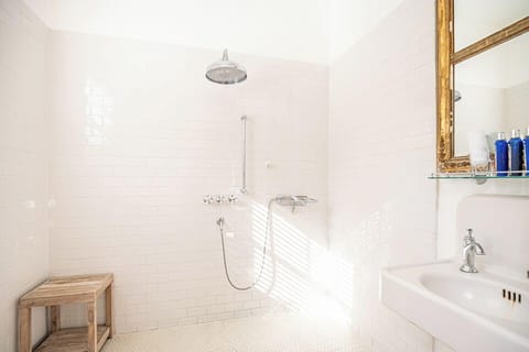 Standard Room, 2 Queen Beds | Bathroom | Combined shower/tub, rainfall showerhead, free toiletries, hair dryer