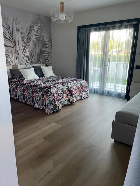 Comfort Double Room, Garden View | In-room safe, desk, laptop workspace, blackout drapes