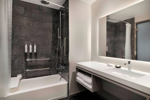 Rainfall showerhead, free toiletries, hair dryer, towels